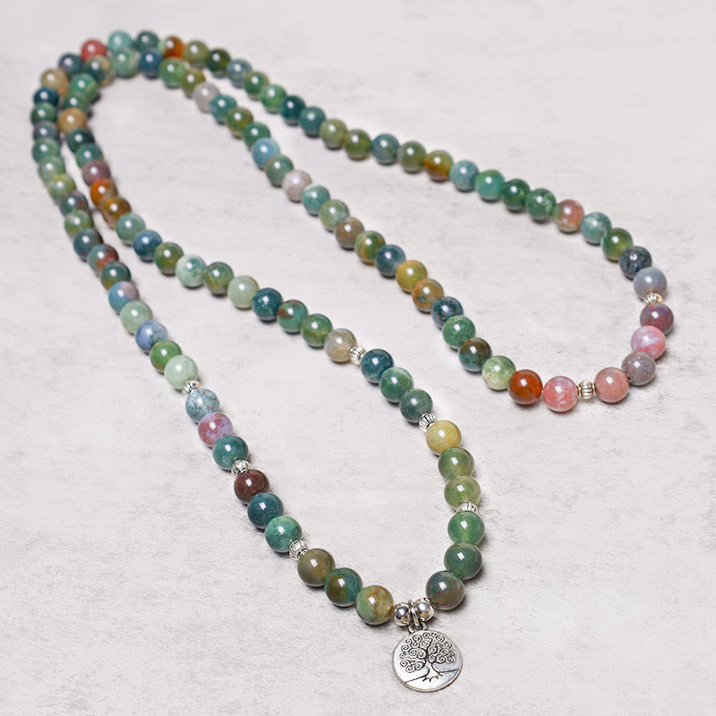 108 Mala Indian Agate Bracelet – agate mala in relaxed loop with silver Tree of Life charm on stone surface