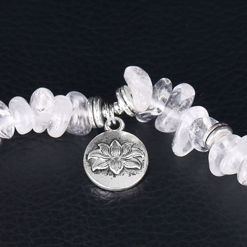 Natural White Crystal Lotus Bracelet – Close-up lotus flower charm with antique silver finish