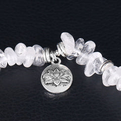 Natural White Crystal Lotus Bracelet – Close-up lotus flower charm with antique silver finish