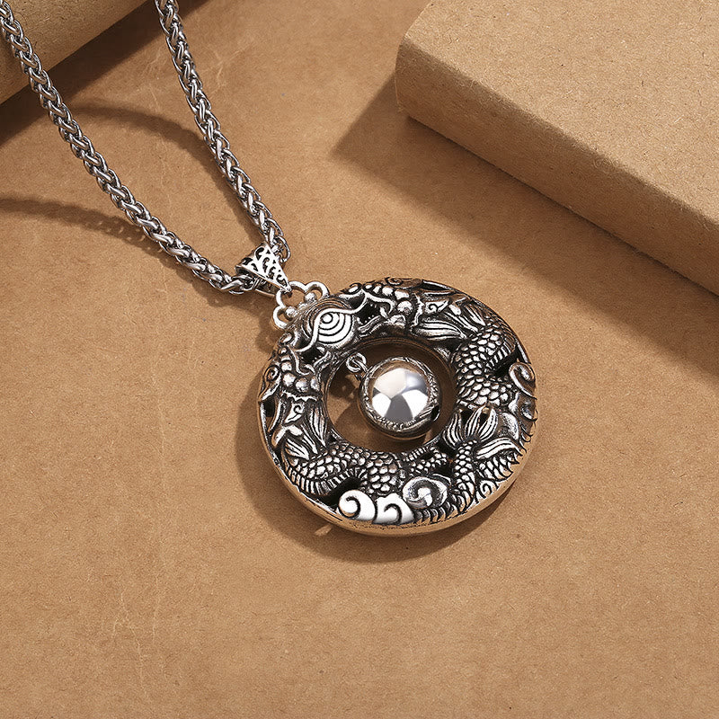 Double Dragon Bead Necklace elevated angle, carved dragon scales, central bead, copper protection pendant