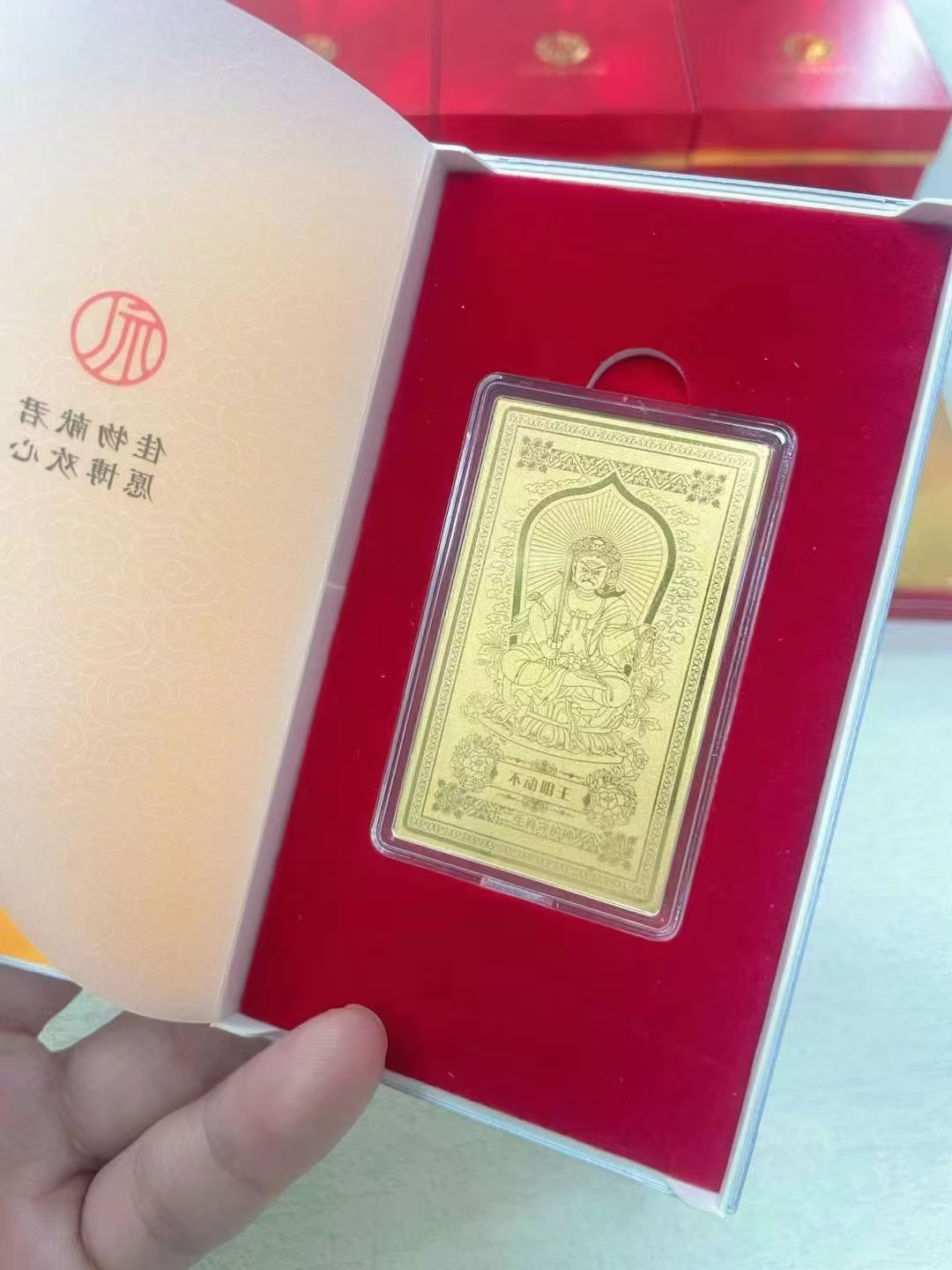 Guardian Gods Gold Foil Phone Sticker – Acala (Fudo Myoo) gold foil card in open red velvet gift box, zodiac guardian collection packaging display