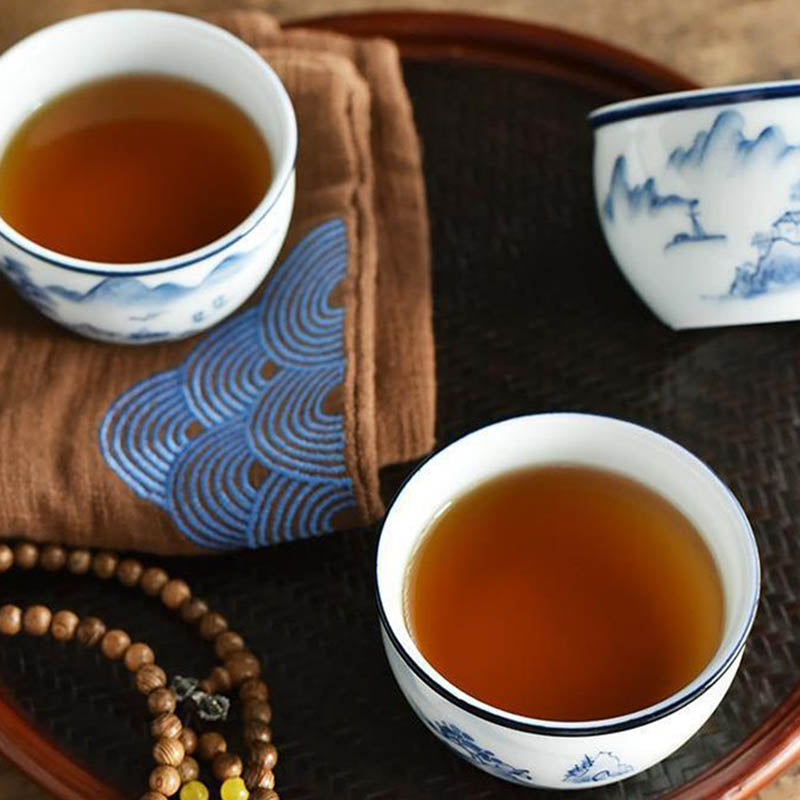 Koi Landscape Teacup – Comparison showing 130ml size next to tea pot