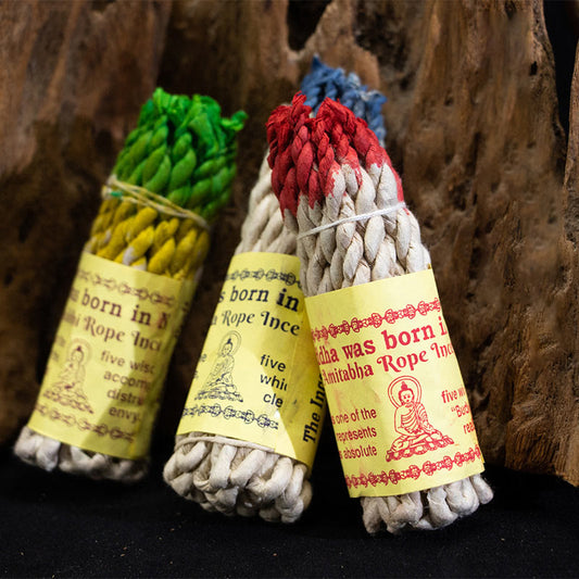 Nepal Rope Incense - three color-dyed bundles on wood with Buddha labels, spiritual healing