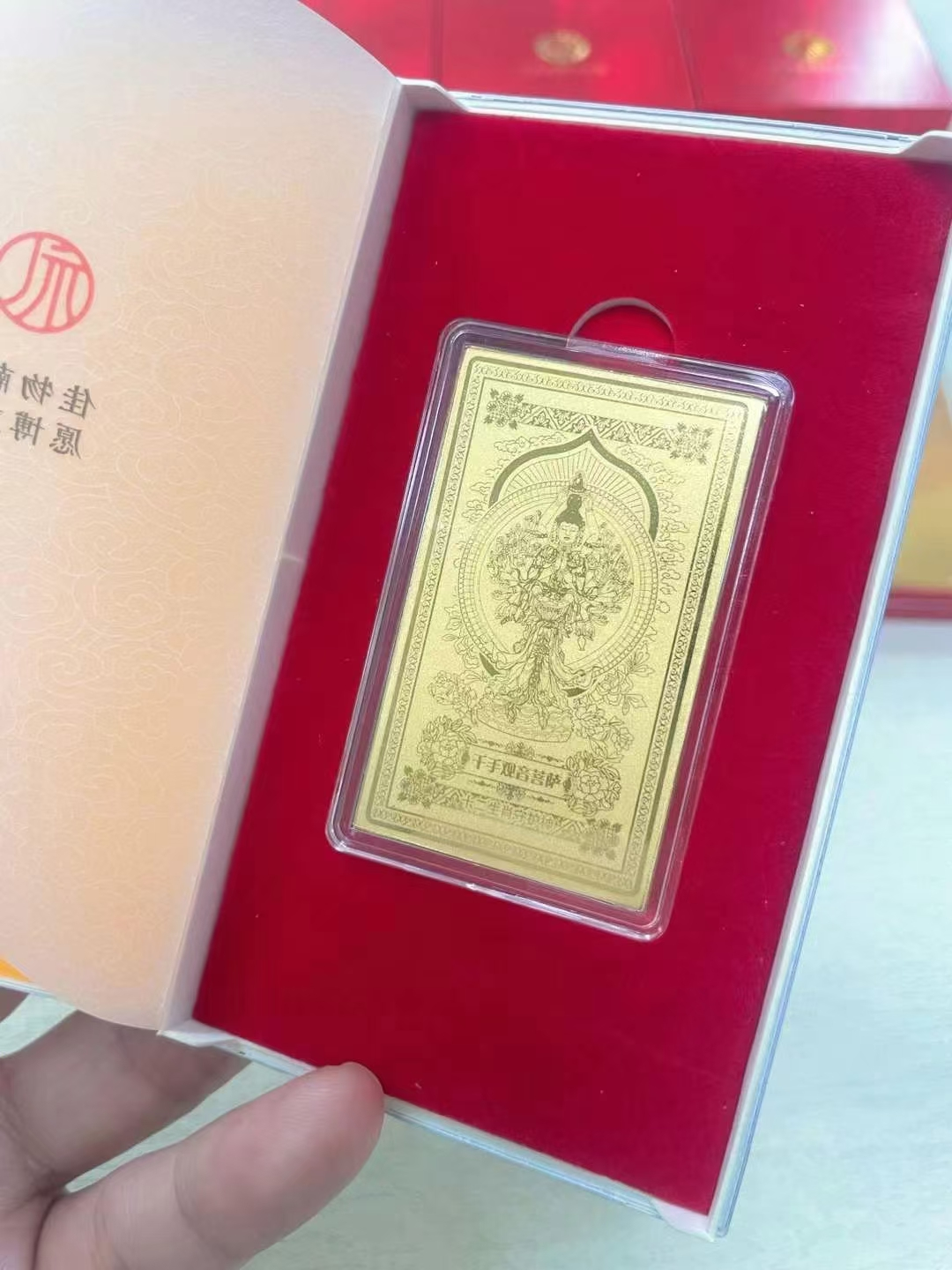Guardian Gods Gold Foil Phone Sticker – Thousand-Hand Guanyin gold foil card in open red velvet gift box, zodiac guardian collection packaging display