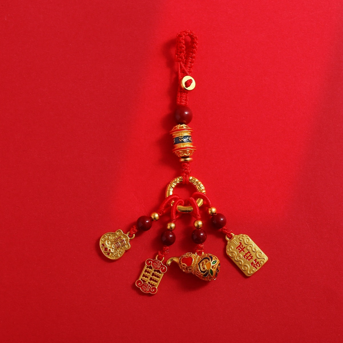 Red cord multi-charm keychain with gold abacus, calabash, lock and peace talisman pendants