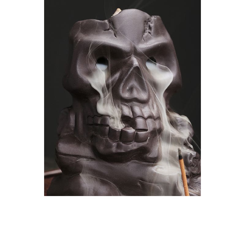 Skull Purple Clay Burner – frontal close-up with ethereal smoke flowing down, skull incense burner