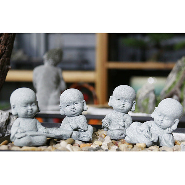 Meditation Monk Statue - Monk statue set arranged on stones with bookshelf background decor