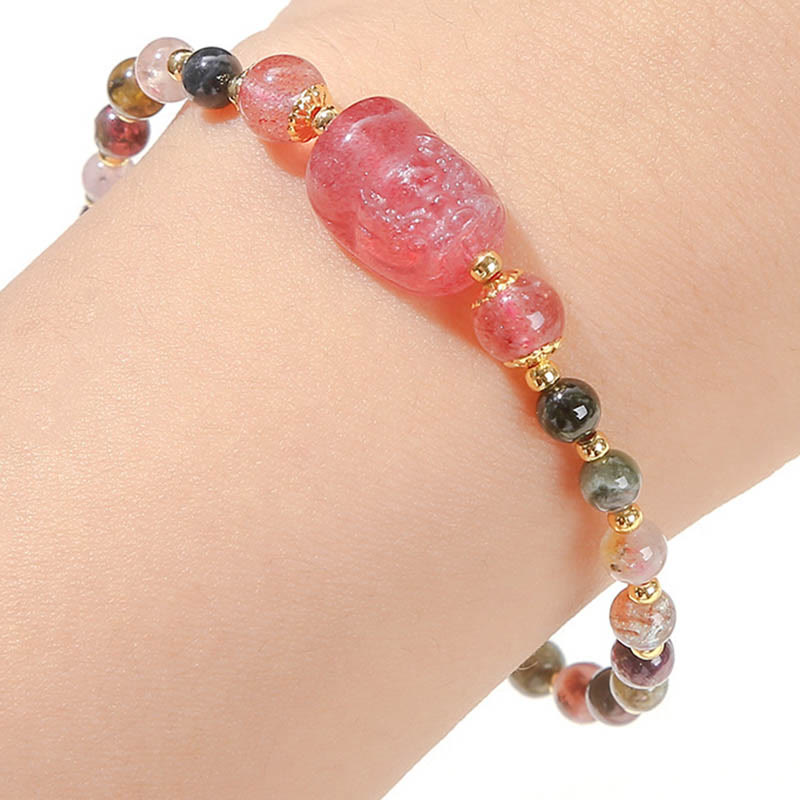 Moonstone Strawberry Quartz Tourmaline Bracelet – Tourmaline bracelet with strawberry quartz PiXiu worn on wrist, energy jewelry