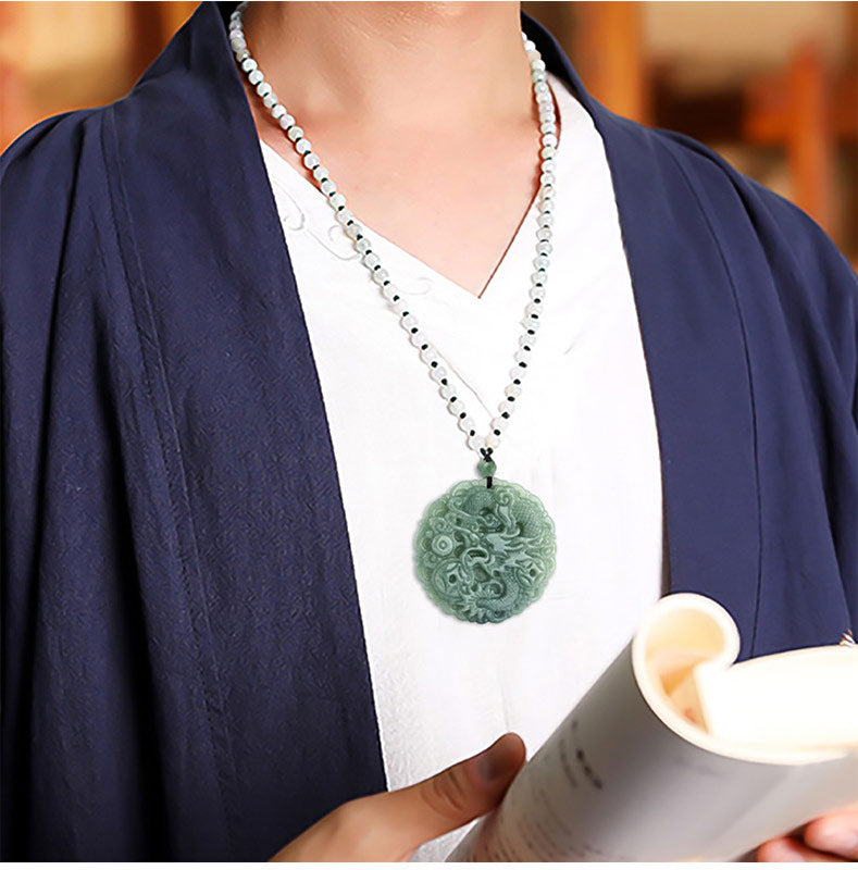Dragon Jade Fortune Necklace – Jade dragon disc worn with navy robe, Fortune