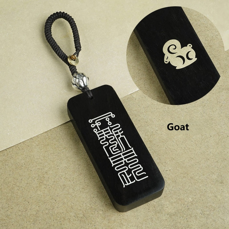 Complete twelve zodiac ebony keychain collection display with silver inlaid animal symbols
