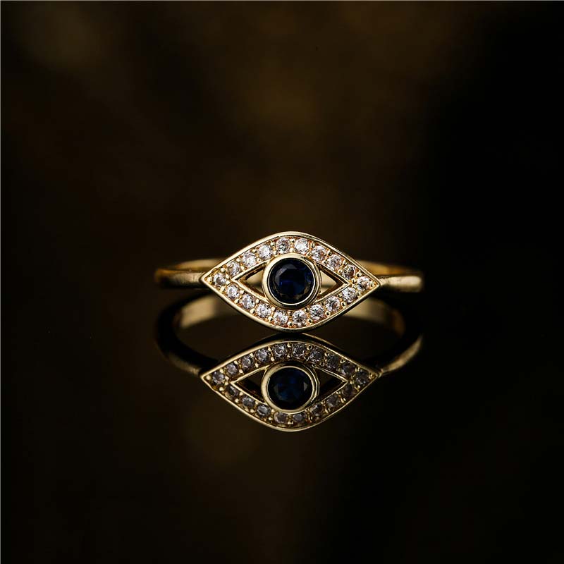 Evil Eye Copper Ring – Gold evil eye ring with sapphire center, diamond pave on black mirror surface