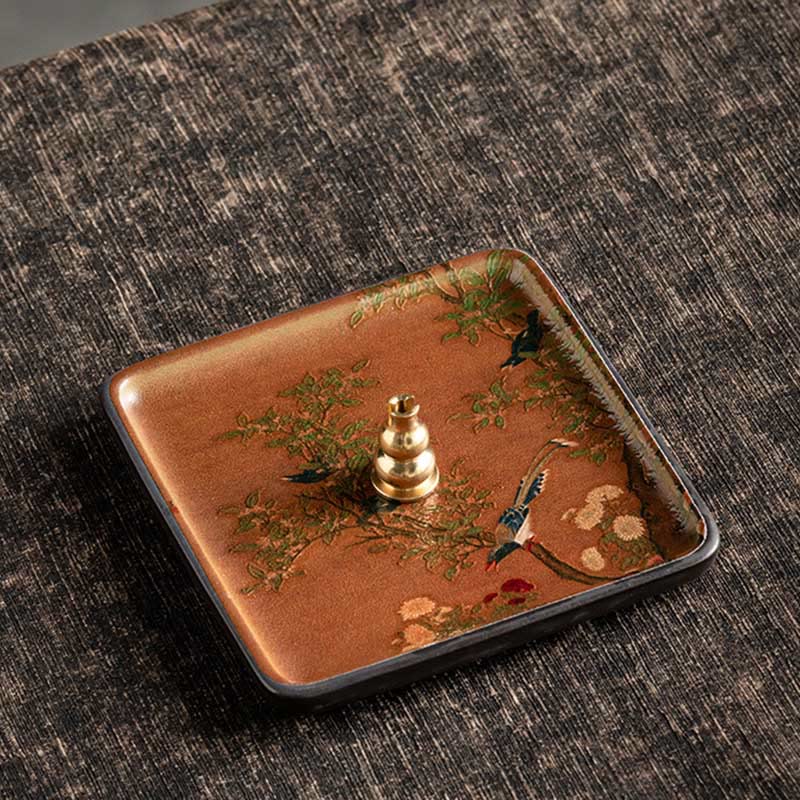 Bird Chrysanthemum Incense Plate – Flying birds among flowers on warm terracotta ceramic with brass holder