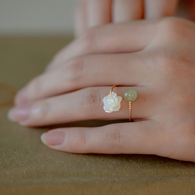 14K Gold Tridacna Jade Rose Ring – Gold open band ring with shell rose and jade aventurine bead, hand modeling, warm neutral matte surface macro view