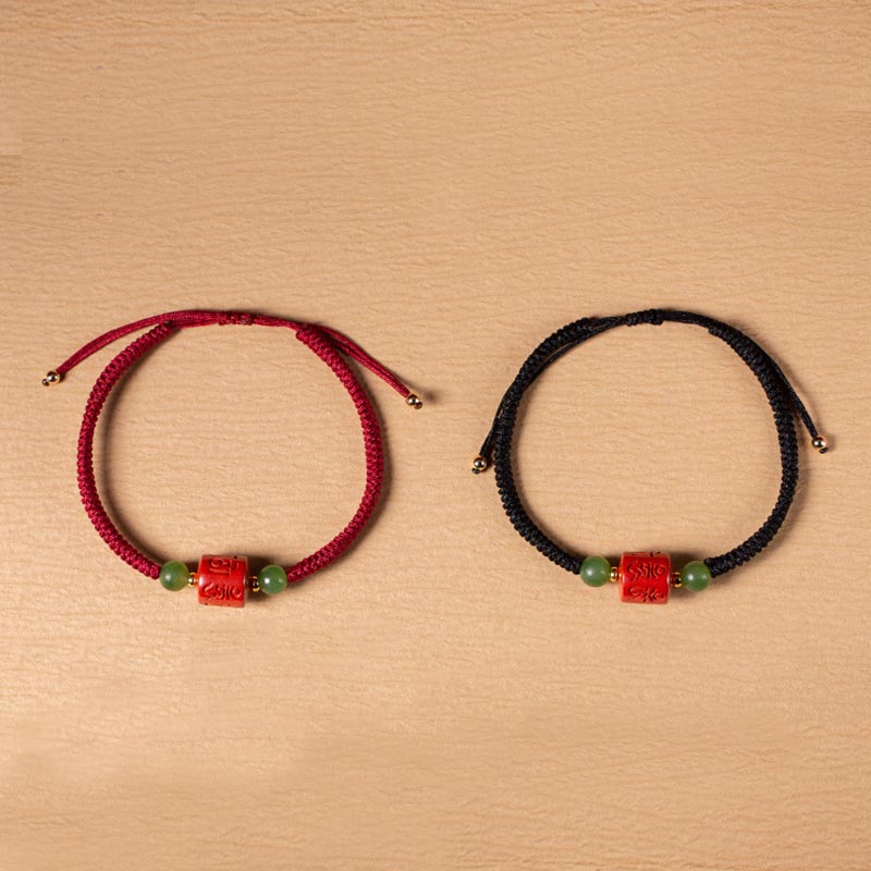Tibetan Cinnabar Braided Rope Bracelet – Top-down view of red and black cord options paired together