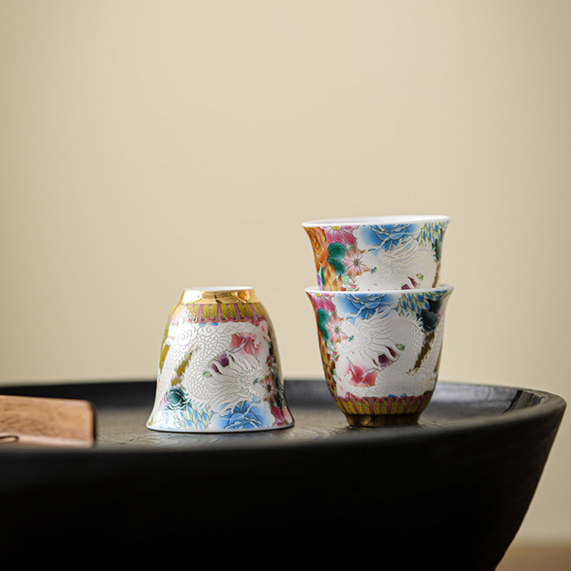 Dragon Phoenix Ceramic Teacup - Stacked trio with inverted cup revealing gold interior, Ornate craft
