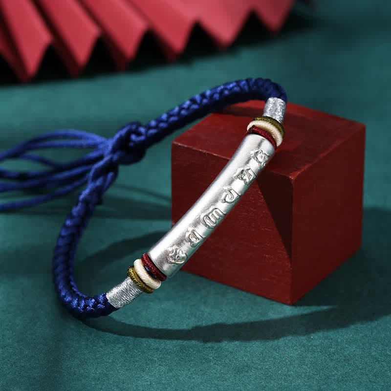 Om Mani Padme Hum Red String Bracelet – Blue cord variant with silver mantra cylinder display