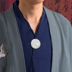 White Jade Dragon Necklace – Dragon jade pendant worn on model against red calligraphy backdrop, Auspicious