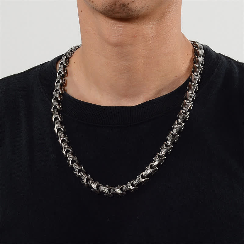 Dragon Necklace Bracelet Set - Geometric silver chain worn on black shirt, Protection