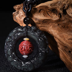 Rainbow Obsidian PiXiu Pendant – Carved rainbow obsidian ring with red cinnabar bead, wood bg