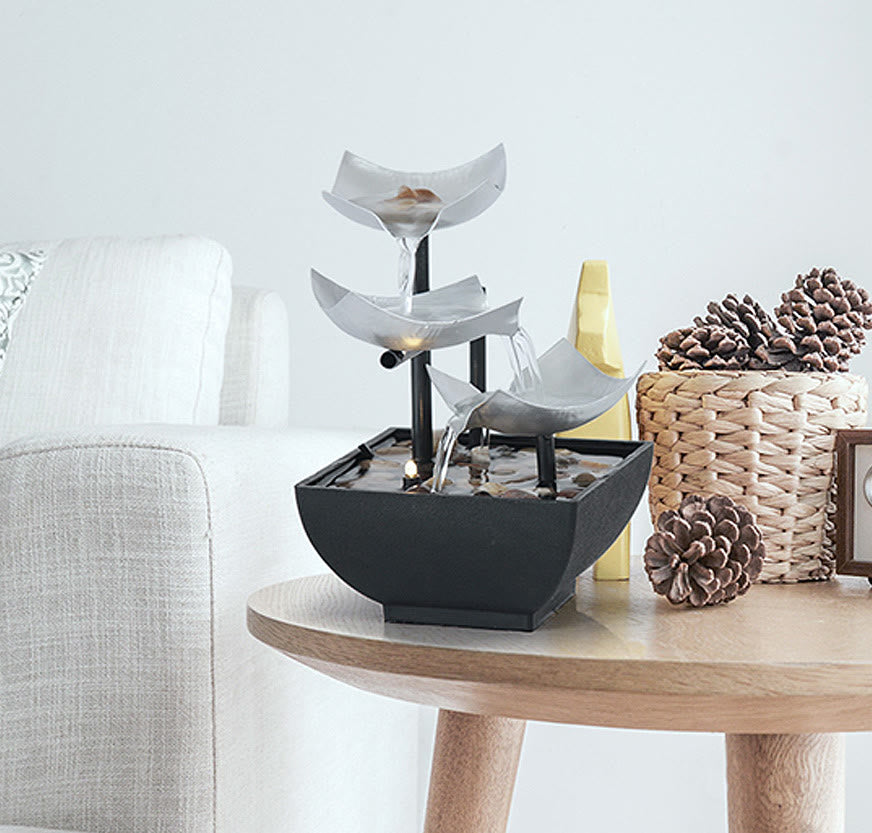 Three Layers Lotus Waterfall Fountain - Silver tiers on oak side table with pine cones, Calming