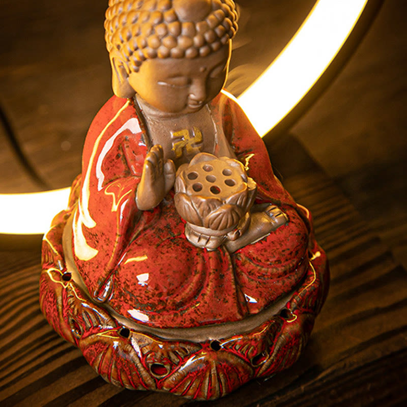 Buddha Lotus incense burner low angle close-up on dark wood, warm golden halo ring, meditation ambiance