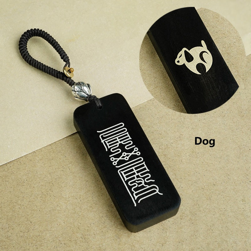 Ebony Big Dipper zodiac keychain dramatic black background showcase with silver inlay detail