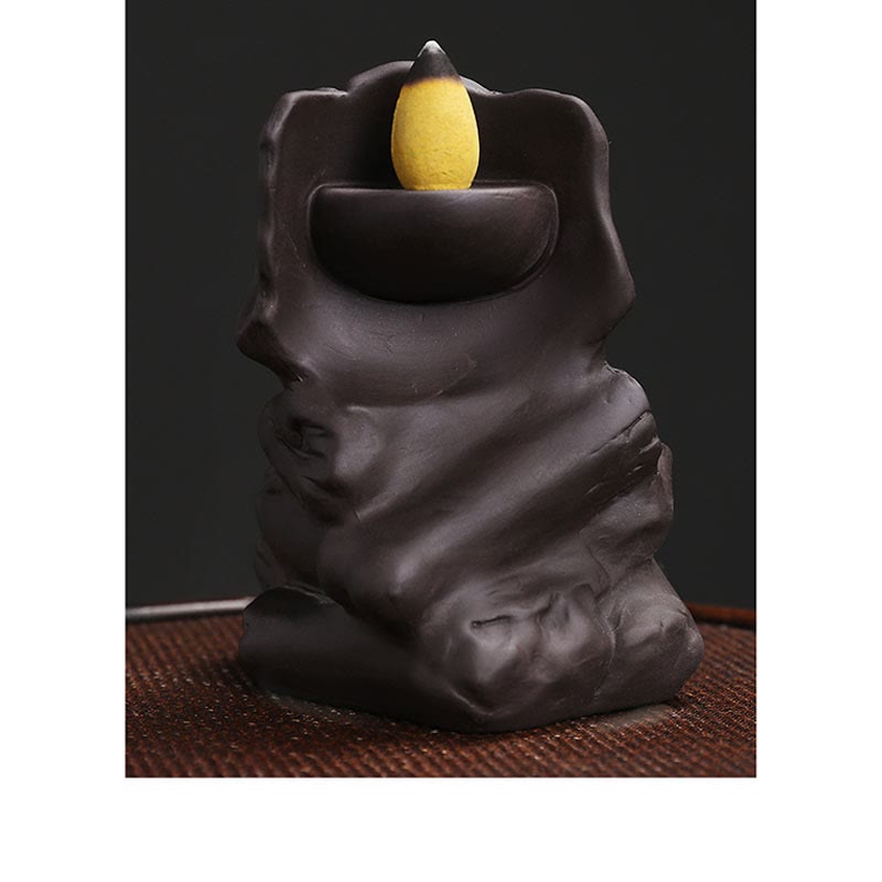 Skull Head Purple Clay Burner – side profile showing teeth and crossbone base, spiritual decor