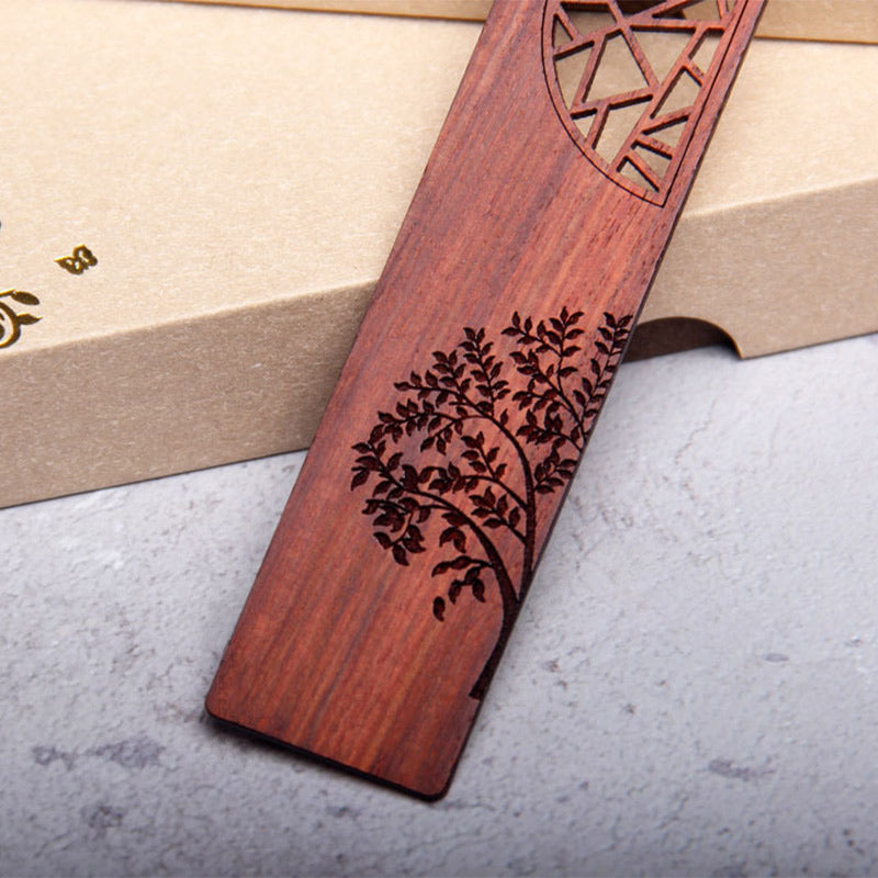 Tree of Life Wood Bookmarks - rosewood bookmark showing detailed tree engraving on kraft box, gray surface
