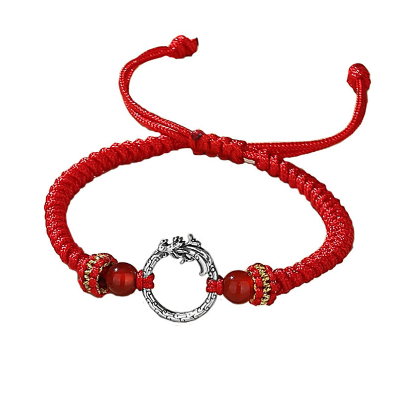 925 Silver Dragon Phoenix Bracelet – Red dragon bracelet on white with translucent carnelian beads and gold knot details