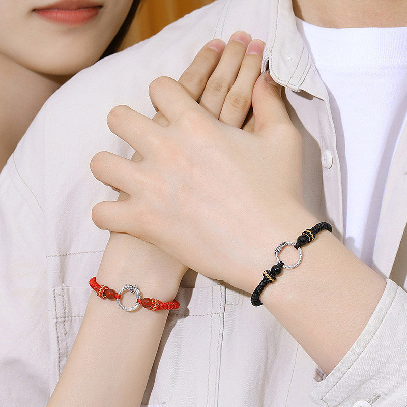 925 Silver Dragon Phoenix Bracelet – Couple wearing red and black dragon bracelets on wrists together, lifestyle shot