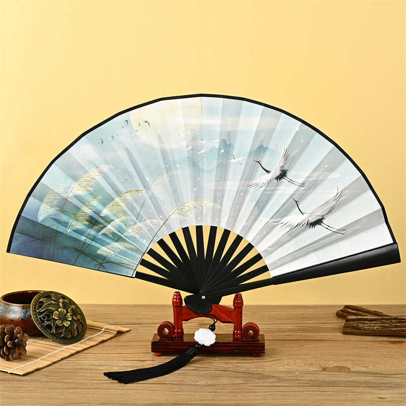 Chinese Folding Fan – Closed folding fan with bamboo ribs and tassel, handheld fan