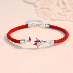 Koi Fish Braided Rope Bracelet - Side angle showing woven rope texture, lucky charm wristband