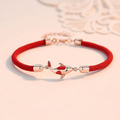 Gold Plated Koi Fish Bracelet - Front view of koi charm on braided rope, feng shui jewelry