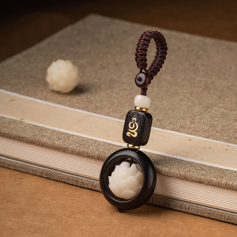 Ebony Wood Bodhi Seed Lotus Key Chain - hanging pendant with gold-inlaid bead, book setting