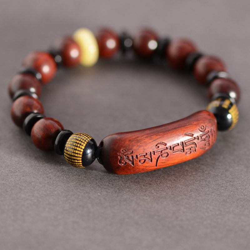 Red Sandalwood Om Bracelet – gray surface, carved mantra wood center with gold accents, mens wooden bracelet Hauptbild