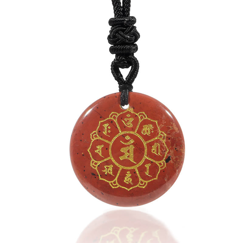 Om Mani Padme Hum Necklace – Red jasper circular pendant with gold Buddhist engraving on white, mantra amulet