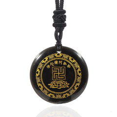 Black Obsidian Multi-Crystal Purification Pendant - front view on white, gold Buddhist symbols on black stone, clean studio shot