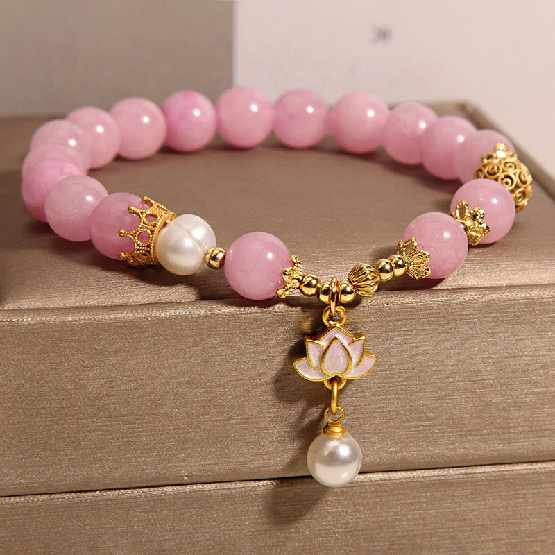 Pink Quartzite Pearl Lotus Bracelet - diagonal view on gold display stand showing lotus pendant, Romantic