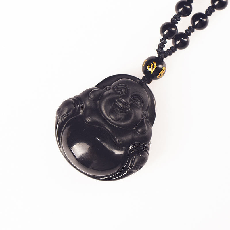 Black Obsidian Buddha Necklace – cleansing ritual setup with sage and Buddha, spiritual practice