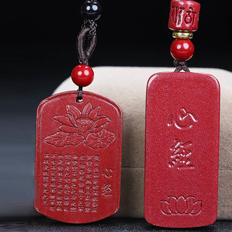 Dual Cinnabar Heart Sutra Pendants – paired view comparing lotus-top and text-front designs, Buddhist amulet set
