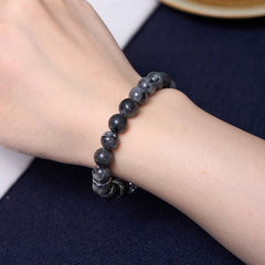 Black Glitter PiXiu Power Bracelet – Speckled gray-black stone beads with silver spacer on navy fabric