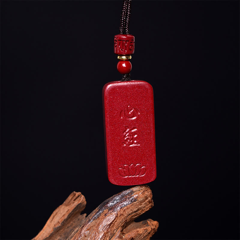 Heart Sutra Cinnabar Necklace – straight-on view with gold spacer bead and cylindrical red bead, red amulet