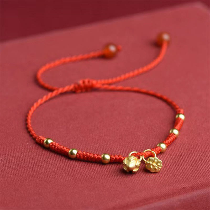Red String Lotus Anklet – Dual gold flower charms on red cord, lotus anklet