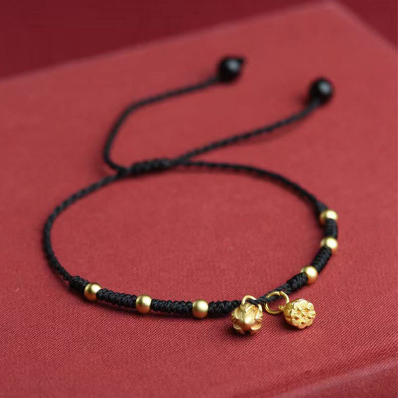 Black Cord Lotus Anklet – Gold lotus and coin charms on black cord, lotus anklet