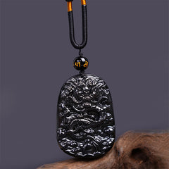 Black Obsidian Dragon Carved Pendant – 3D carved Chinese dragon on polished stone with gold mantra bead, protective