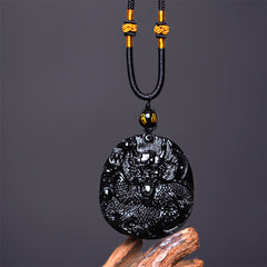 Black Obsidian Round Dragon Pendant – full dragon body carved on round disc with wood base, auspicious