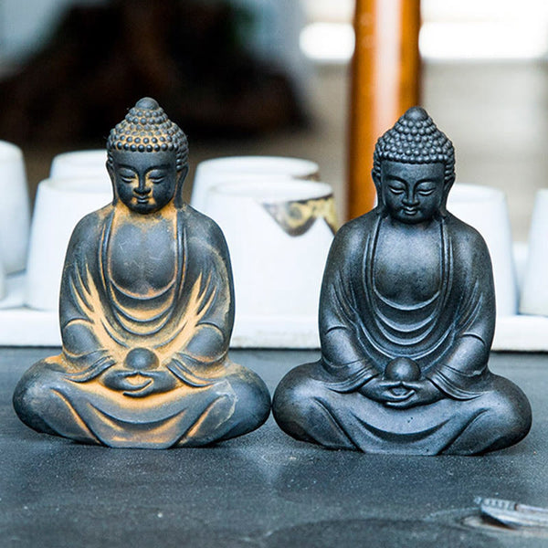 Tibetan Meditating Buddha Statue – warm glow on meditating buddha, candlelit tibetan statue ambiance