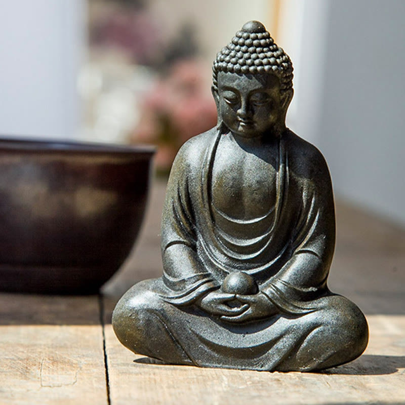 Tibetan Meditating Buddha Statue – compassionate face close-up detail, serene tibetan buddha expression