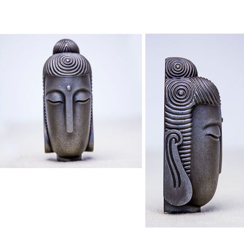 Closed Eyes Meditating Buddha Statue – collection display with green plants, nature inspired zen decoration