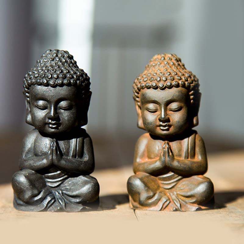 Small Sakyamuni Statue – close-up of hand in dhyana mudra resting on lap peacefully